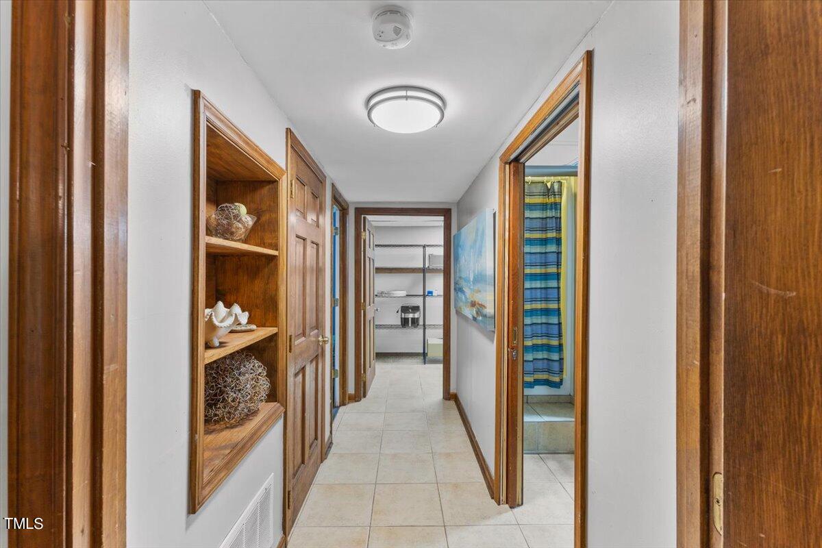 6713 Laurdane Road Raleigh, NC 27613 - Photo 36 of 47 a view of a hallway and interior of the house
