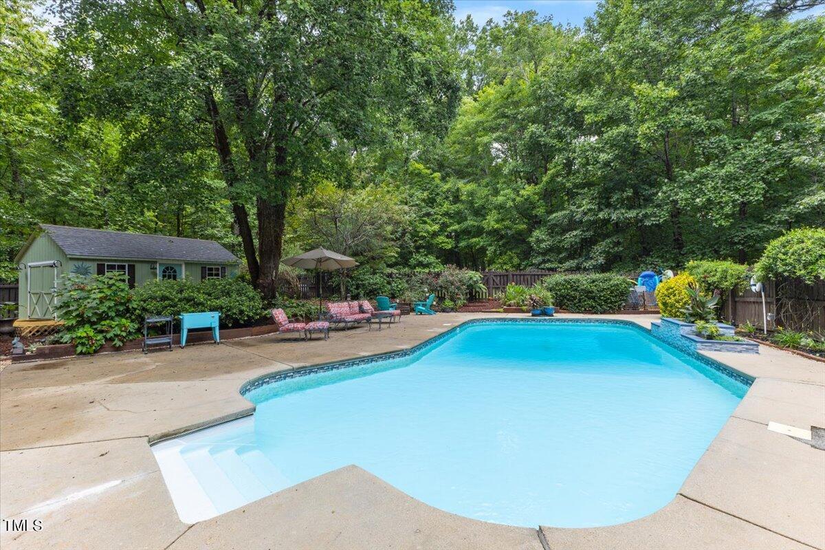6713 Laurdane Road Raleigh, NC 27613 - Photo 44 of 47 a view of a swimming pool with a patio