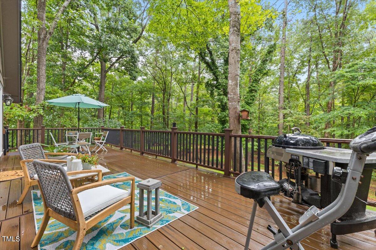 6713 Laurdane Road Raleigh, NC 27613 - Photo 9 of 47 a view of a chairs and table in the balcony