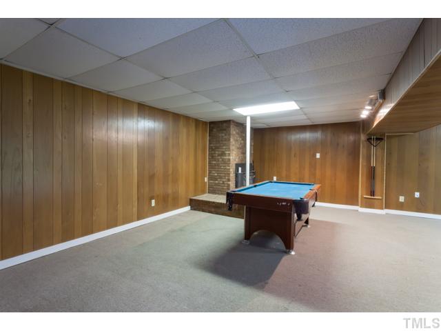 11709 Strickland Road Raleigh, NC 27613 - Photo 17 of 25 a room with furniture and air hockey table