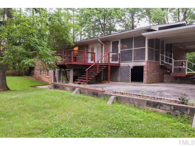 11709 Strickland Road Raleigh, NC 27613 - Photo 25 of 25 a view of backyard of house with seating space