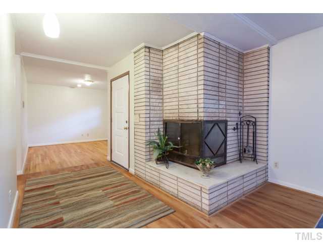 11709 Strickland Road Raleigh, NC 27613 - Photo 4 of 25 a living room with furniture