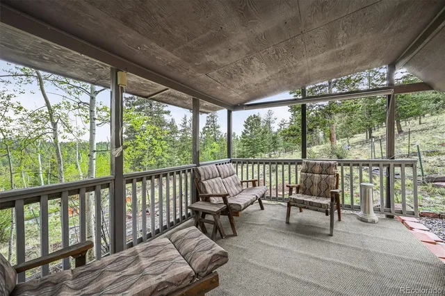 a view of a town with mountains in the background