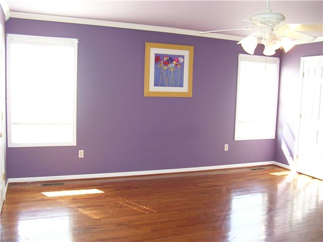 1075 Cliff White Road Columbia, TN 38401 - Photo 11 of 20 Large Master on first floor, has finished wood flooring, 2 walk-in closets and master bath.