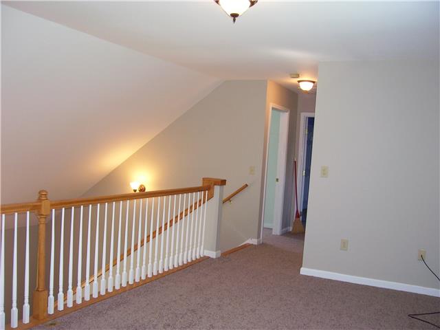 1075 Cliff White Road Columbia, TN 38401 - Photo 14 of 20 Enjoy the great view of the back yard and beyond from the open loft or bonus space. All of the upstairs has brand new carpet!