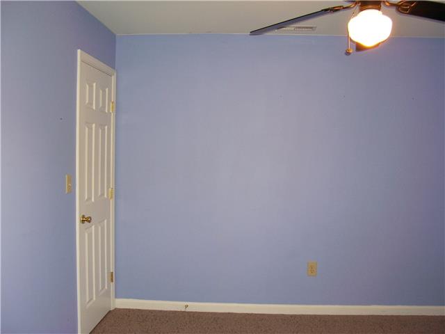 1075 Cliff White Road Columbia, TN 38401 - Photo 16 of 20 Third guest bedroom has ceiling light and fan and a walk in closet.