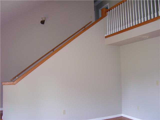 1075 Cliff White Road Columbia, TN 38401 - Photo 7 of 20 Another view of stairway leading to open loft or bonus area.