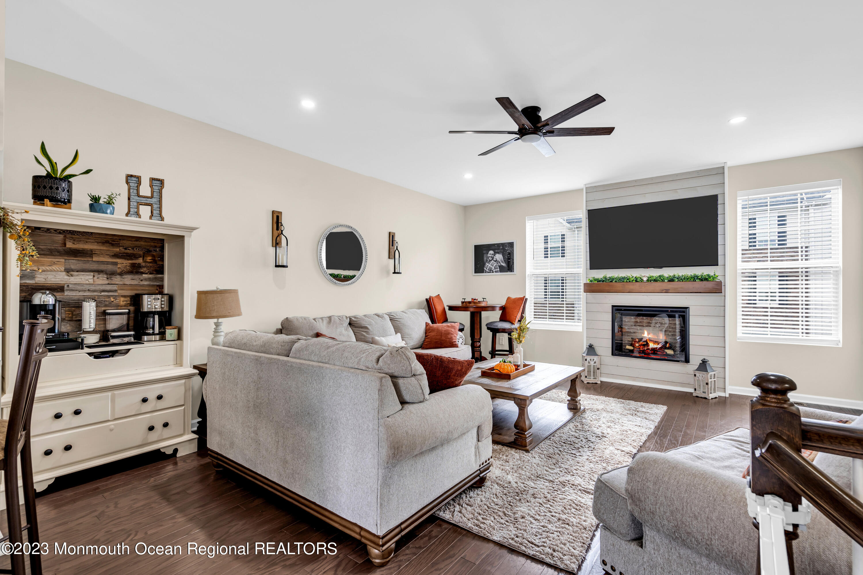 201 Revival Road Brick, NJ 08723 - Photo 22 of 41 a living room with furniture and a fireplace
