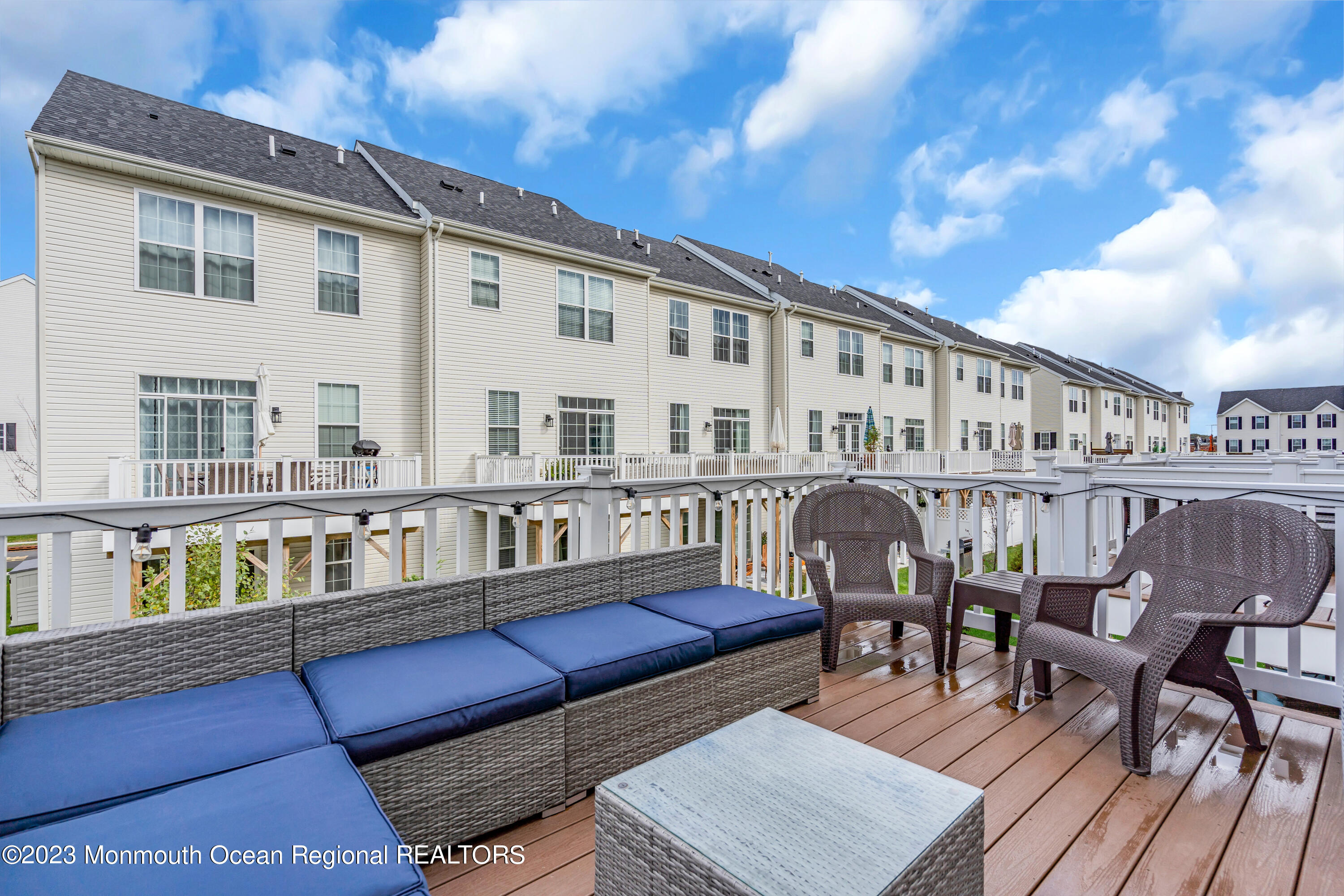 201 Revival Road Brick, NJ 08723 - Photo 26 of 41 a balcony with table and chairs