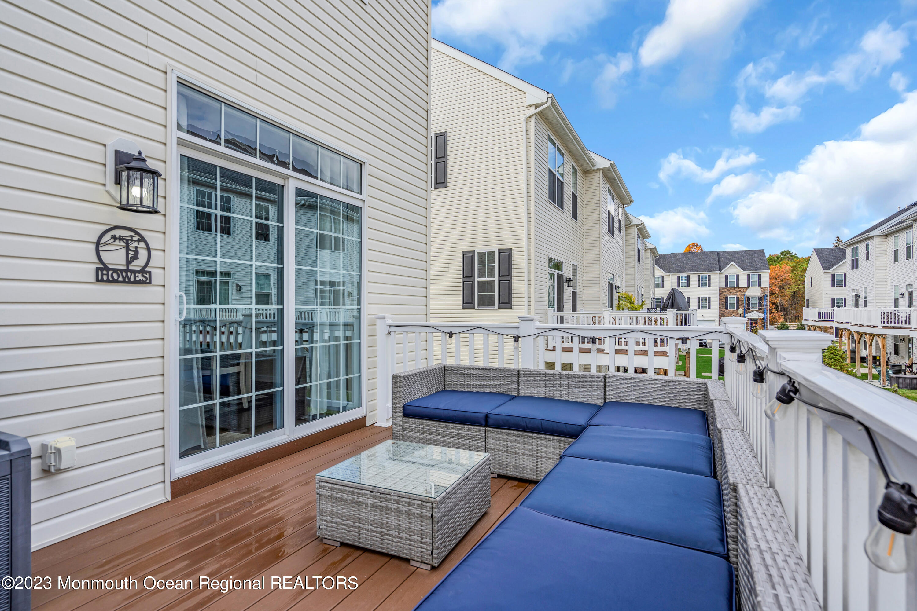 201 Revival Road Brick, NJ 08723 - Photo 27 of 41 a view of front red house with outdoor seating