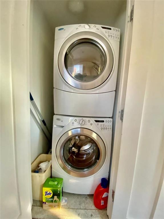 1244 Avenue X, Unit 2A Brooklyn, NY 11235 - Photo 14 of 14 a utility room with dryer and washer