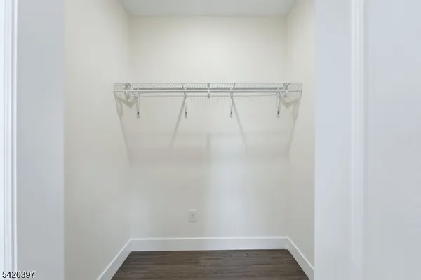 a view of an empty walk in closet