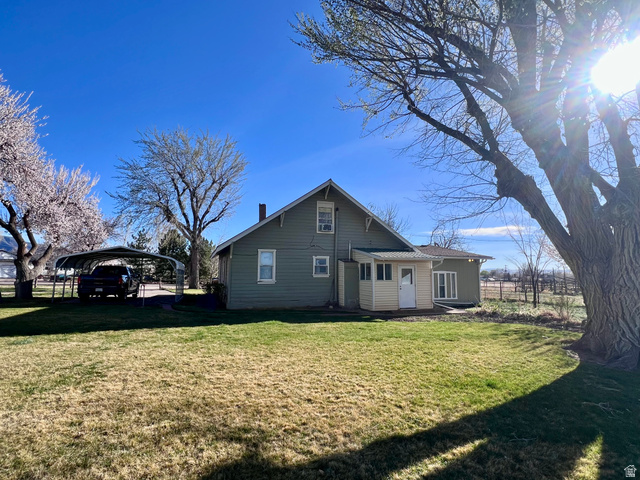 479 East 100 N Road Meadow, UT 84644 - Photo 42 of 59 View of side of property featuring a detached carport
