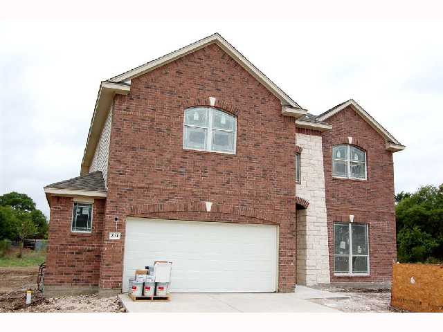 231 Devil River Loop Georgetown, TX 78628 - Photo 1 of 1 a front view of a house with a yard