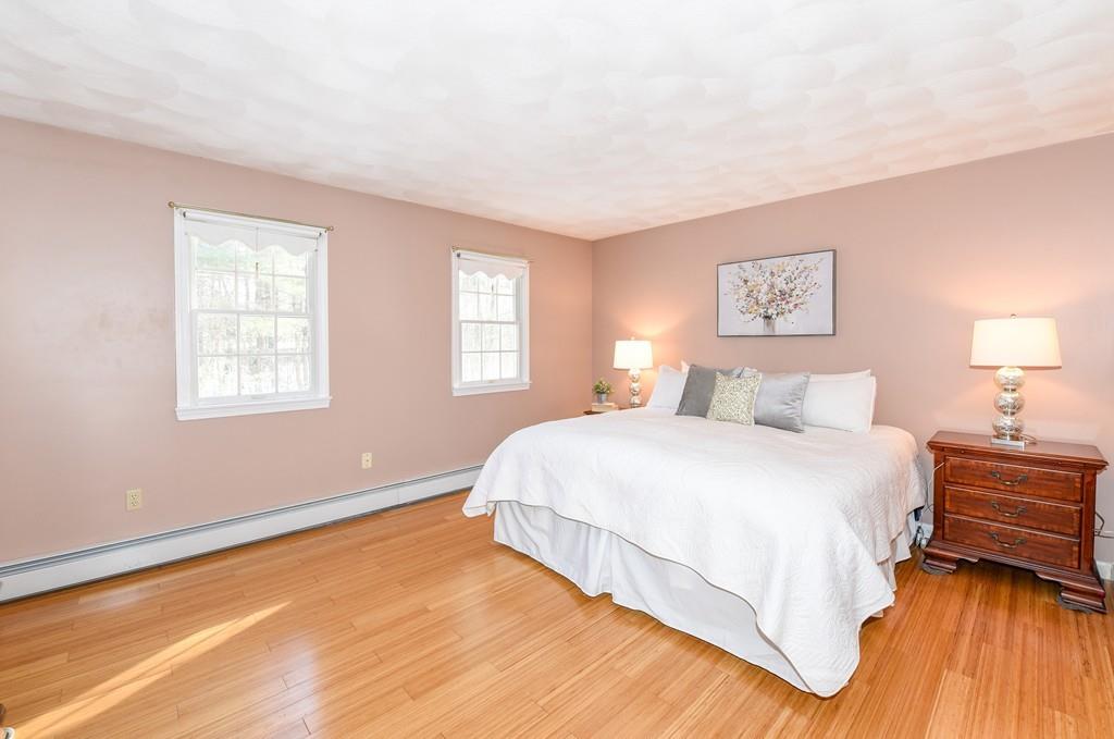 624 Boston Road Groton, MA 01450 - Photo 14 of 25 a bedroom with a bed and a window