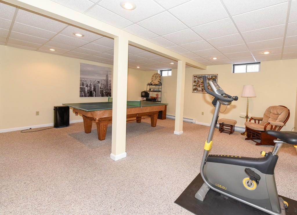 624 Boston Road Groton, MA 01450 - Photo 19 of 25 a room with gym equipment and wooden floor
