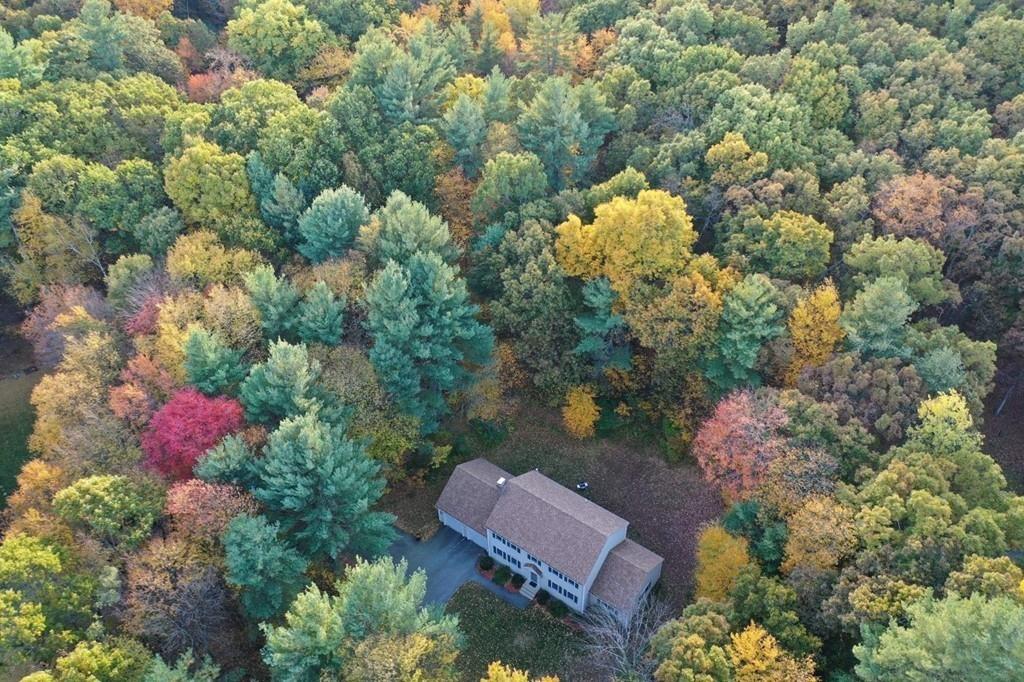 624 Boston Road Groton, MA 01450 - Photo 23 of 25 an aerial view of a house with a yard and lake view