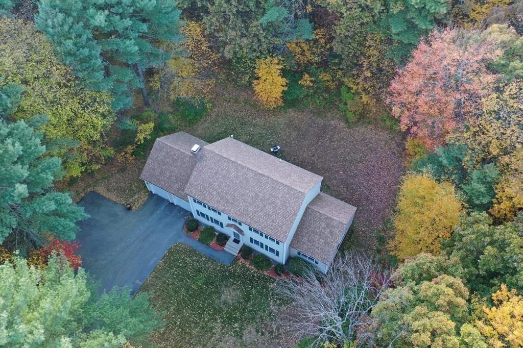 624 Boston Road Groton, MA 01450 - Photo 24 of 25 an aerial view of a house with a yard