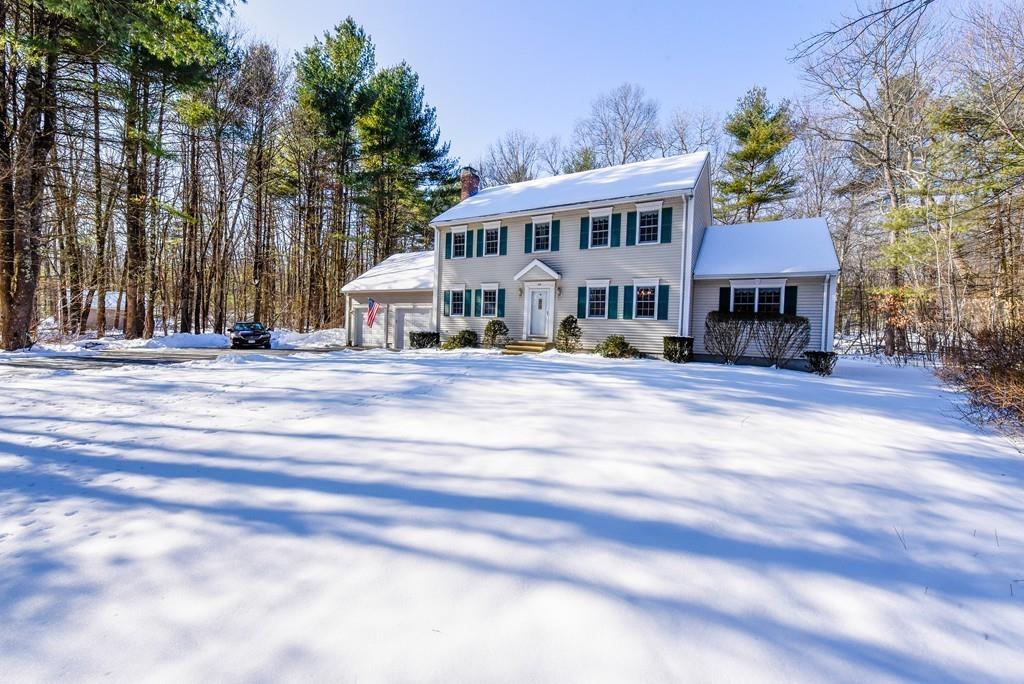 624 Boston Road Groton, MA 01450 - Photo 25 of 25 a front view of residential houses with yard and trees