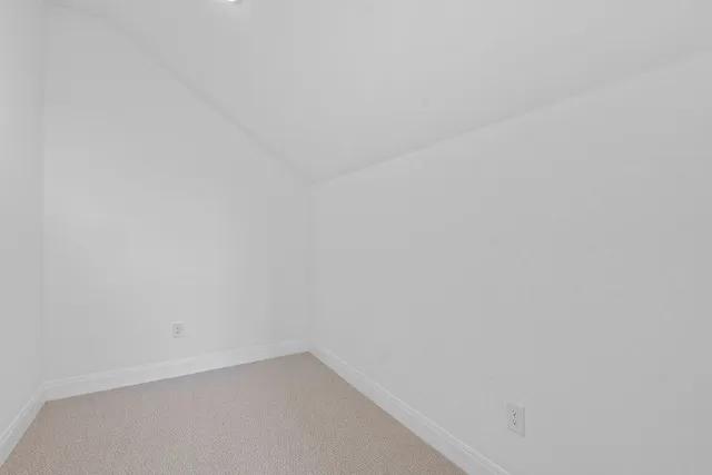 a bathroom with a shower sink and mirror