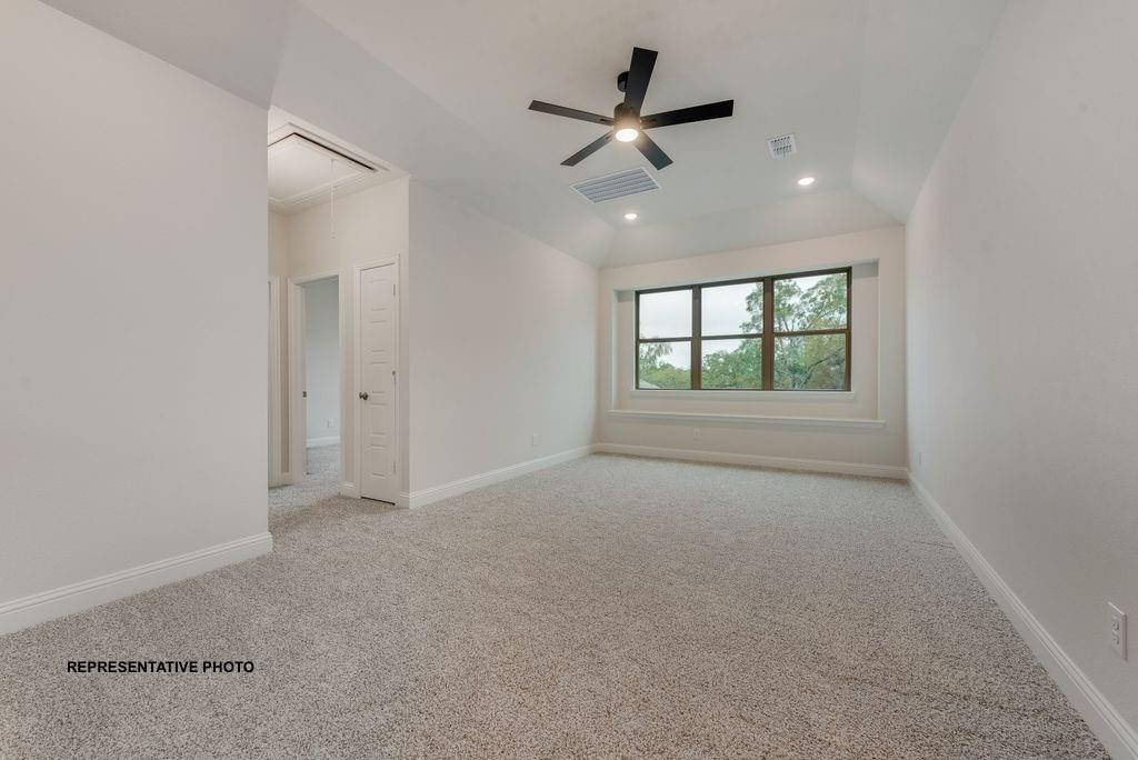 1032 Monaco Court Springtown, TX 76082 - Photo 17 of 18 wooden floor in an empty room with a window