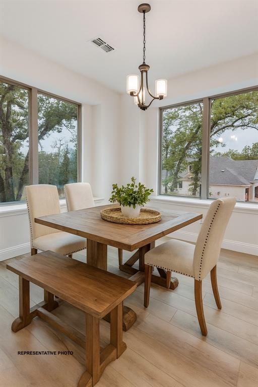 1032 Monaco Court Springtown, TX 76082 - Photo 8 of 18 a view of a dining room with furniture window and outside view