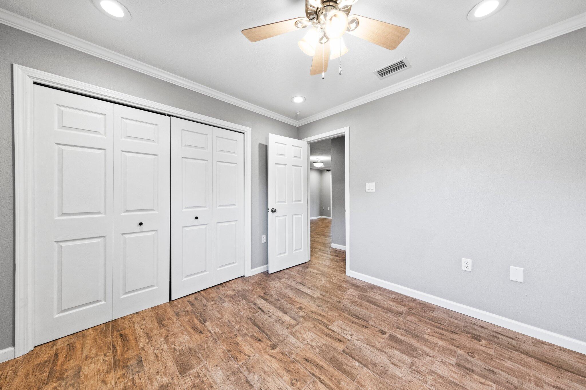 226 Terri Cove Niceville, FL 32578 - Photo 22 of 42 a view of a livingroom with a chandelier fan