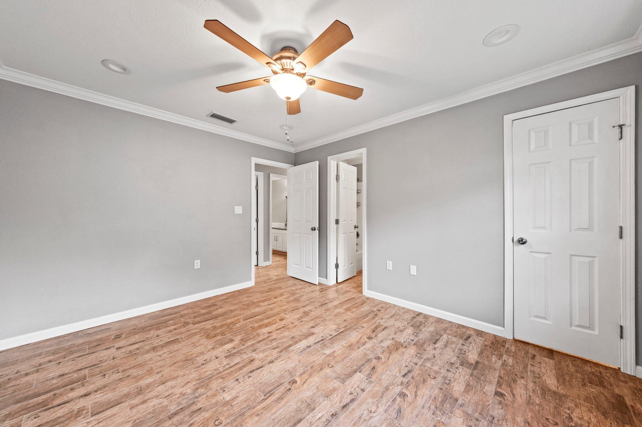 226 Terri Cove Niceville, FL 32578 - Photo 26 of 42 wooden floor in an empty room