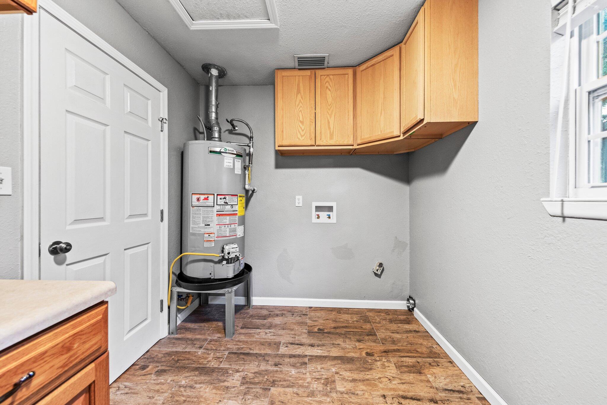 226 Terri Cove Niceville, FL 32578 - Photo 32 of 42 a view of a storage and utility room with a window