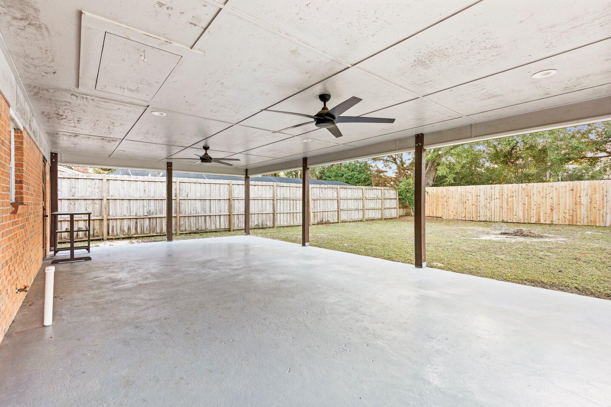 226 Terri Cove Niceville, FL 32578 - Photo 33 of 42 a view of an empty room with a sliding door