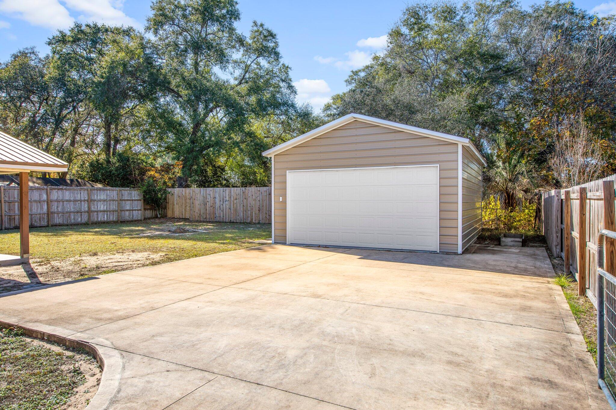 226 Terri Cove Niceville, FL 32578 - Photo 39 of 42 a view of a house with a outdoor space