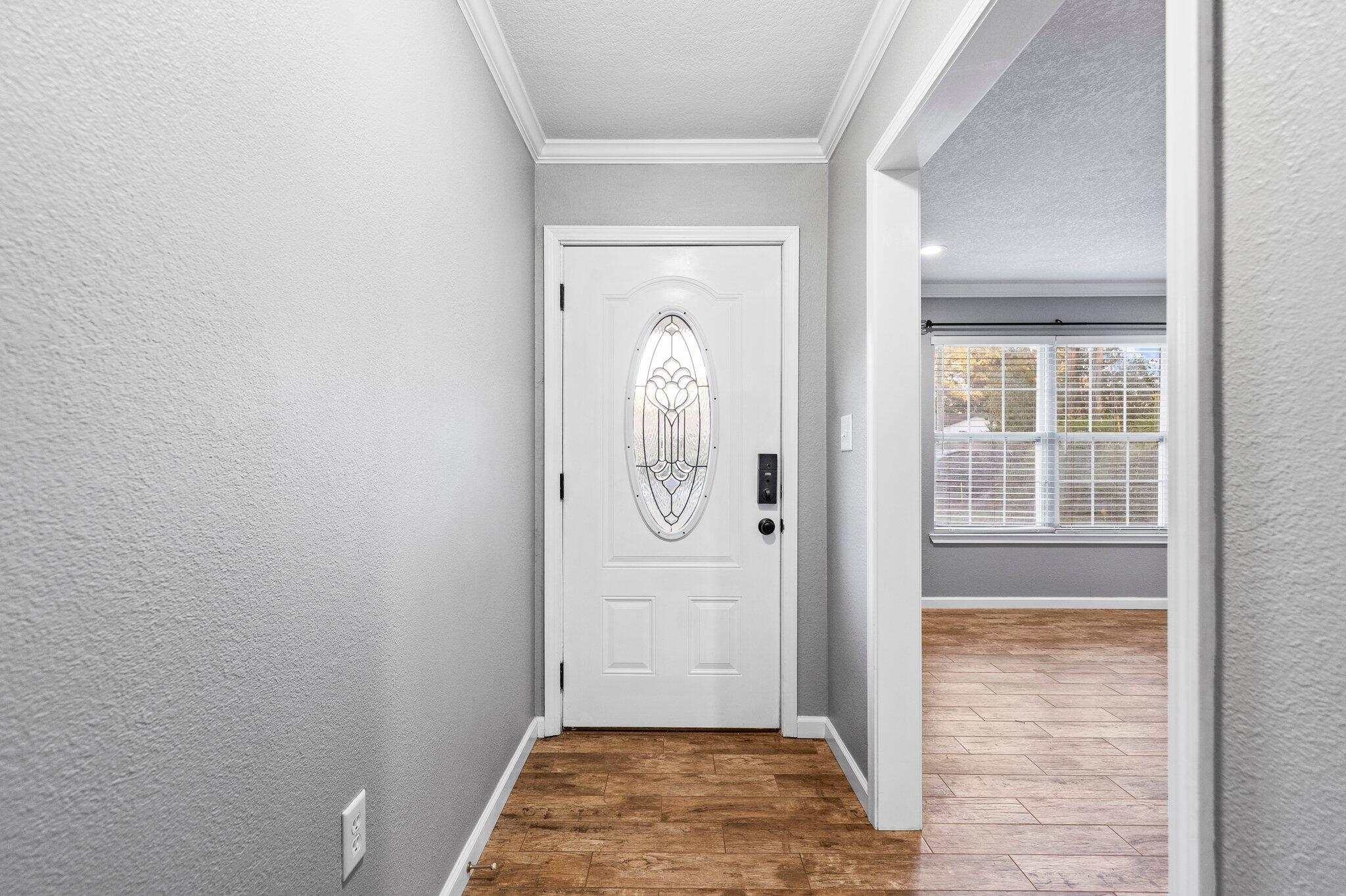226 Terri Cove Niceville, FL 32578 - Photo 6 of 42 a view of front door with wooden floor
