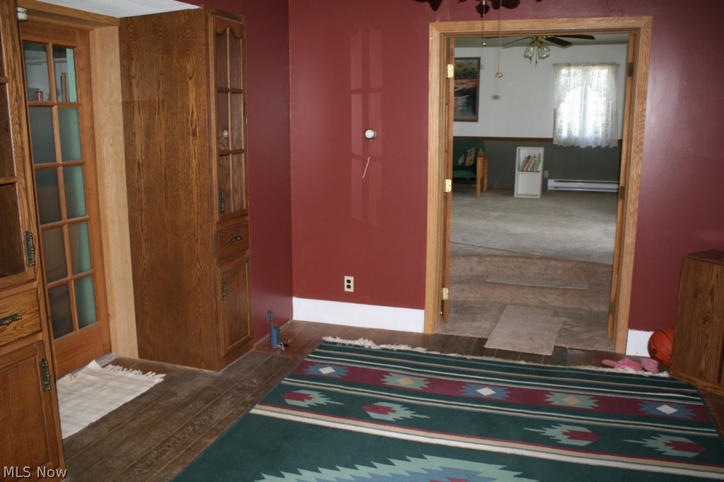 6015 Millbrook Road Shreve, OH 44676 - Photo 4 of 21 Enter the home into the dining room with built in's and access to the den/bedroom, living room or kitchen, lovely oak cabinetry