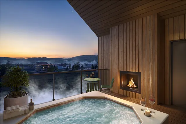 a living room with furniture a fireplace and a fireplace