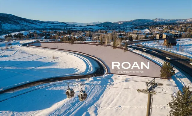 a view of a house with a mountain