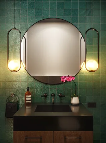 a bathroom with a sink and mirror
