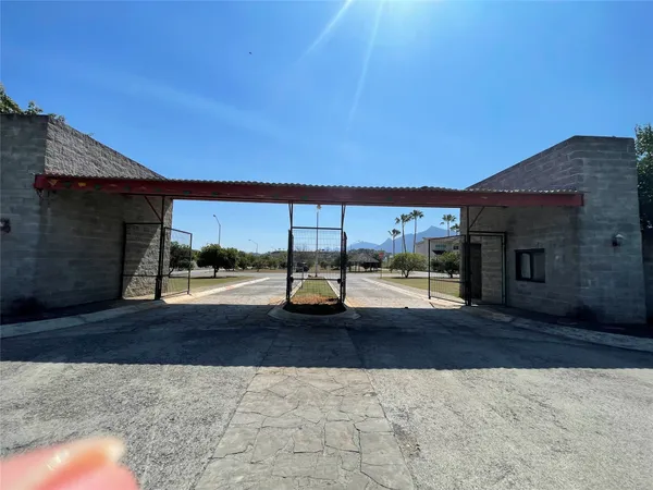 a view of swimming pool with an outdoor seating