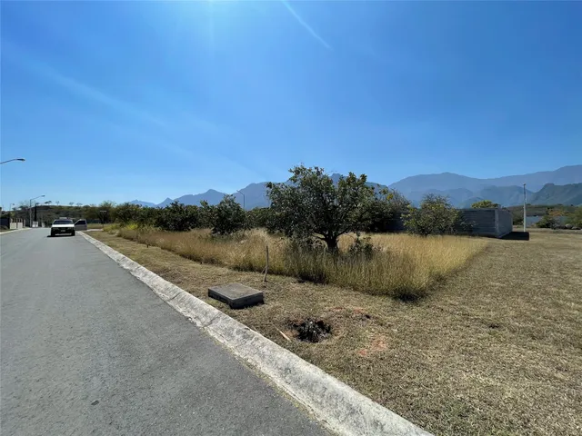 a view of lake with mountain in the background