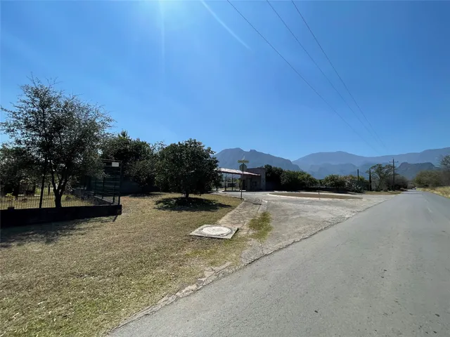 a view of swimming pool with a yard