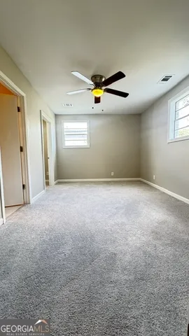 a view of a yard with trees