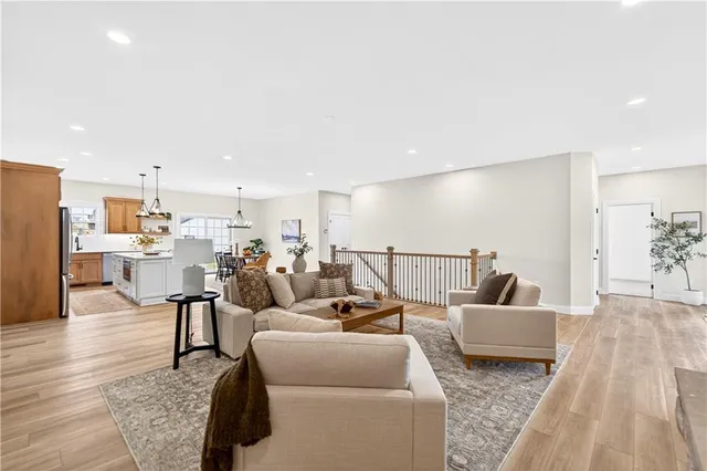 a living room with furniture and a table