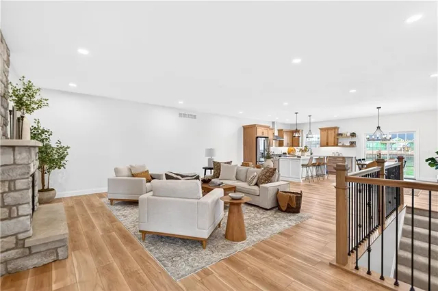 a living room with furniture and a table