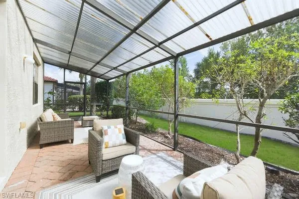 a balcony with furniture
