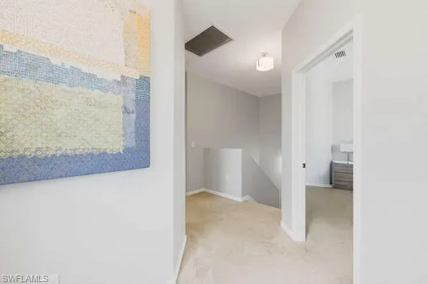 a view of a room with an empty space