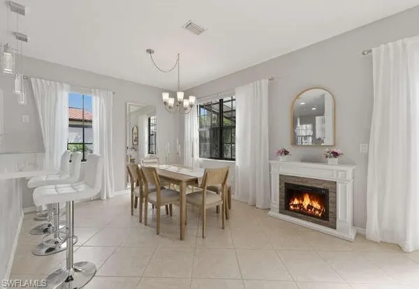 a view of a livingroom with furniture and a fireplace