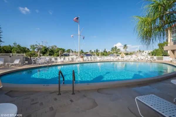a view of an house with backyard space and garden