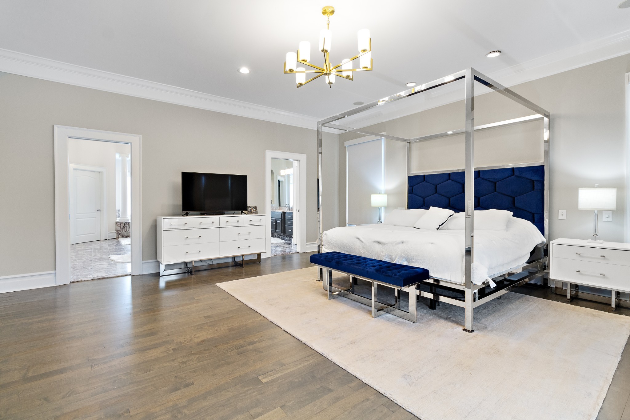 1598 Palmer Road Lebanon, TN 37090 - Photo 17 of 56 a bedroom with a bed and a flat screen tv