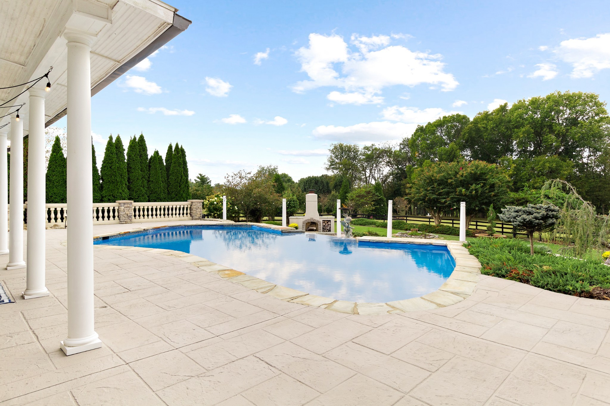 1598 Palmer Road Lebanon, TN 37090 - Photo 34 of 56 a view of a swimming pool with a yard