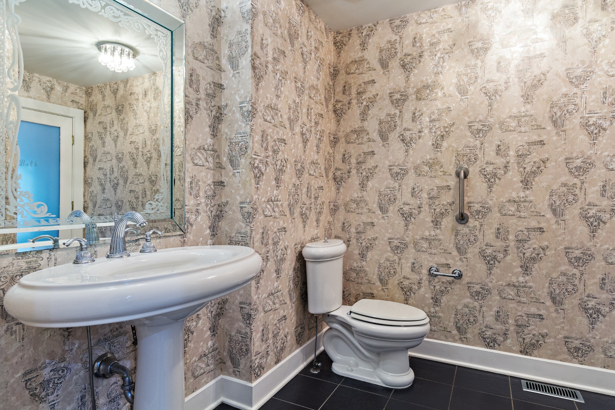 1598 Palmer Road Lebanon, TN 37090 - Photo 51 of 56 a bathroom with a toilet a sink and a mirror