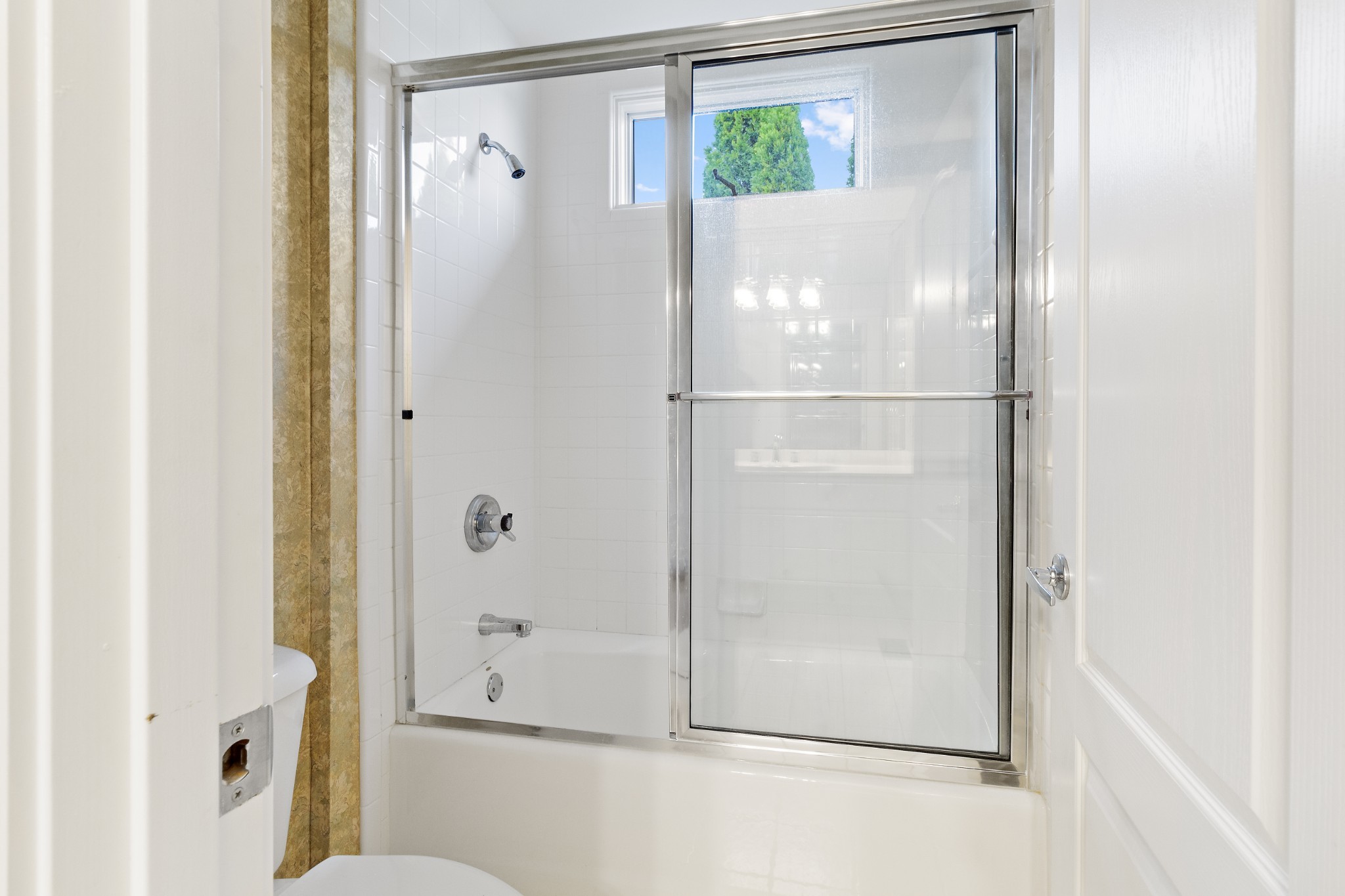 1598 Palmer Road Lebanon, TN 37090 - Photo 54 of 56 a bathroom with a glass shower door